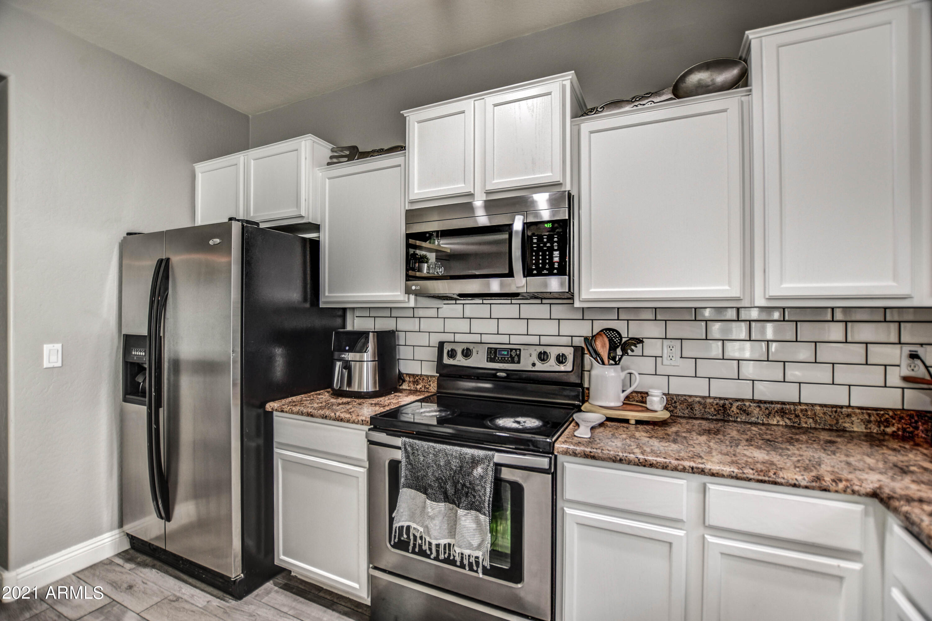 10225 West Camelback Road, Unit 49 Phoenix, AZ 85037 - Photo 14 of 31 KITCHEN 8