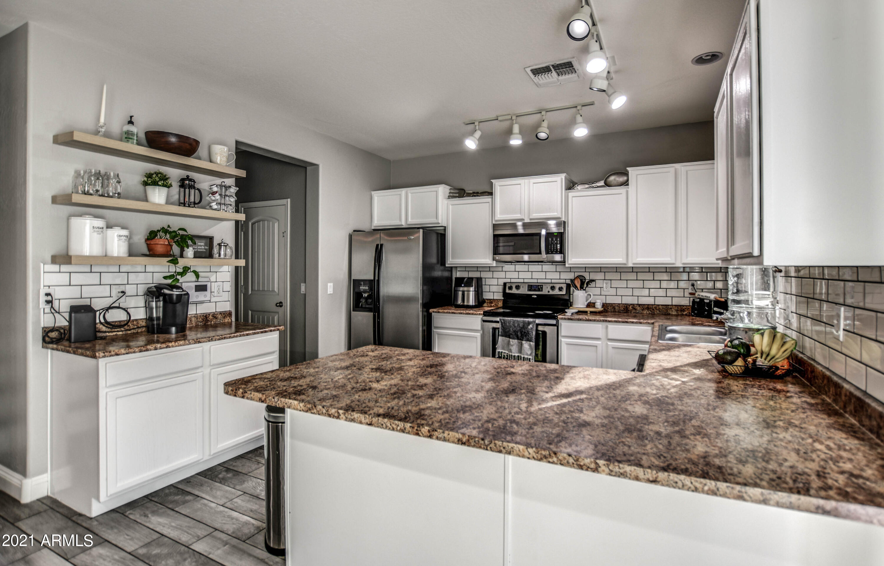 10225 West Camelback Road, Unit 49 Phoenix, AZ 85037 - Photo 9 of 31 KITCHEN 2