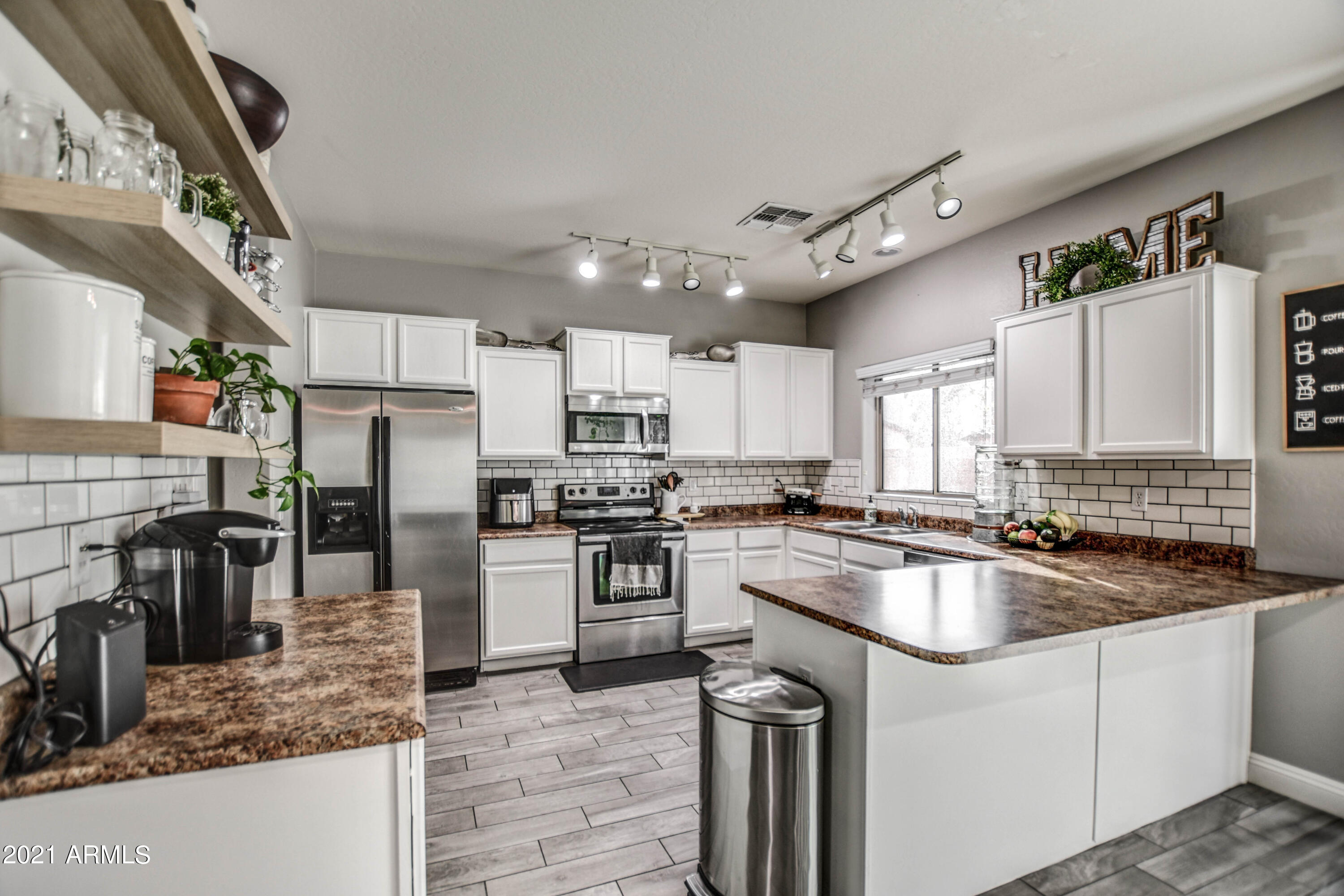 10225 West Camelback Road, Unit 49 Phoenix, AZ 85037 - Photo 10 of 31 KITCHEN 3