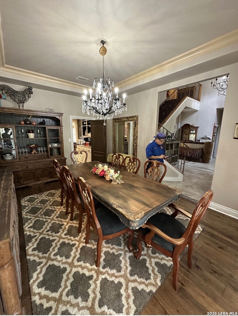 359 Park Ridge Boerne, TX 78006 - Photo 4 of 10 a view of a dining room with furniture and chandelier