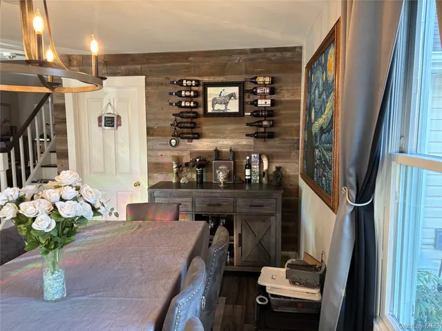 a kitchen with stainless steel appliances granite countertop a refrigerator a stove top oven a sink and dishwasher