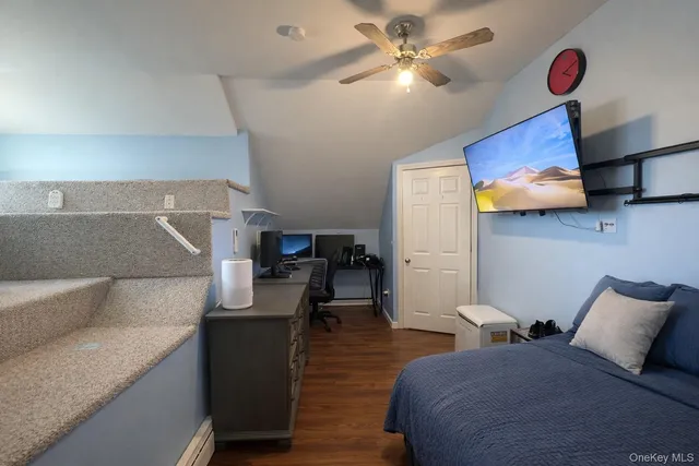 a close view of a utility room with dryer and washer