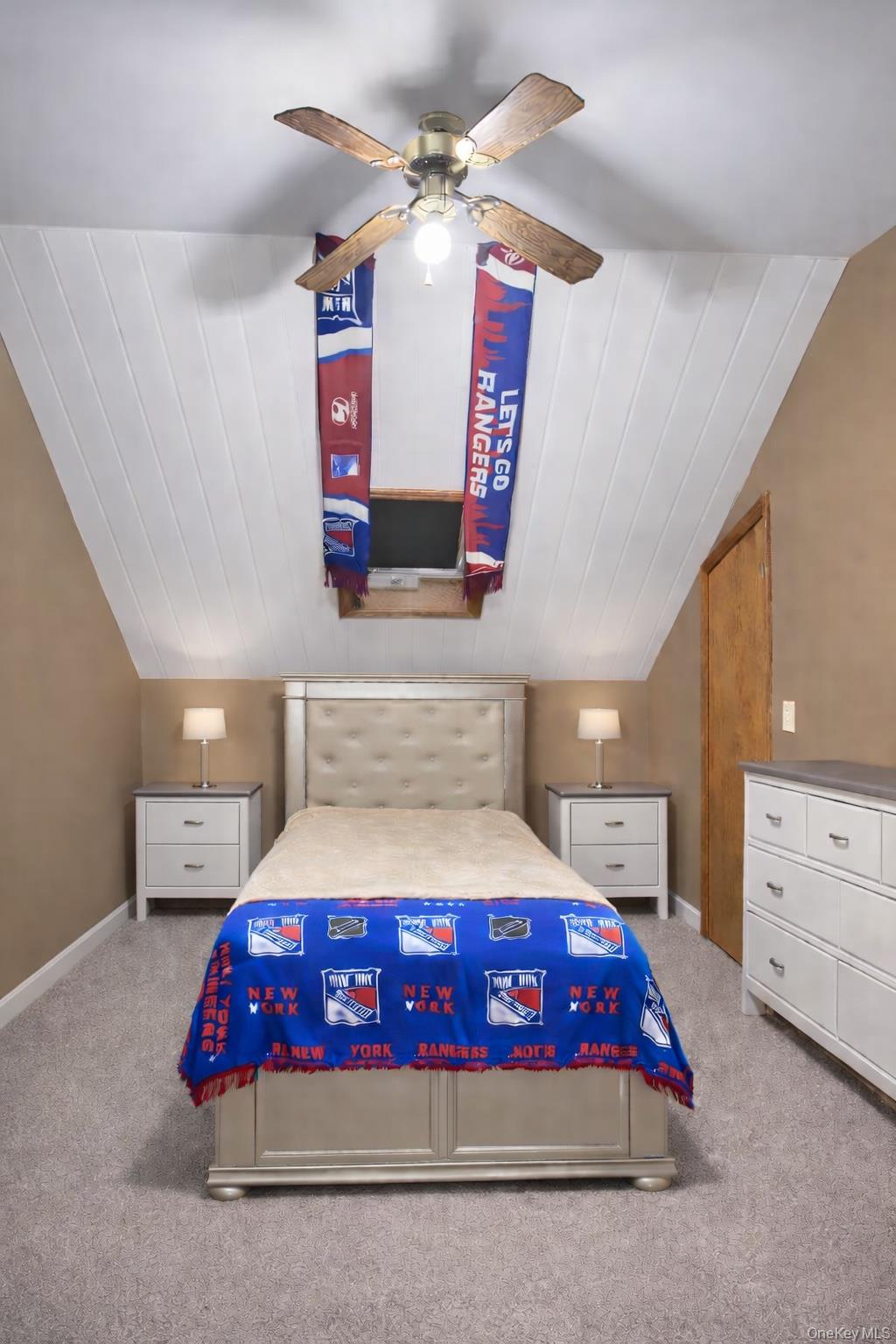 40 Alton Road Babylon, NY 11702 - Photo 29 of 41 Bedroom featuring light colored carpet, ceiling fan, and lofted ceiling