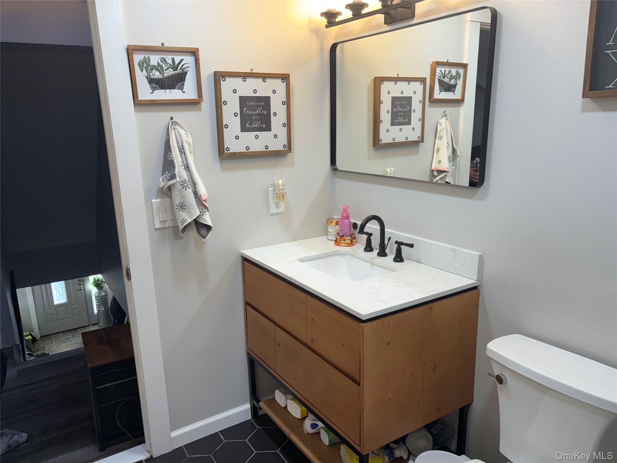 40 Alton Road Babylon, NY 11702 - Photo 31 of 41 Bathroom featuring toilet and vanity