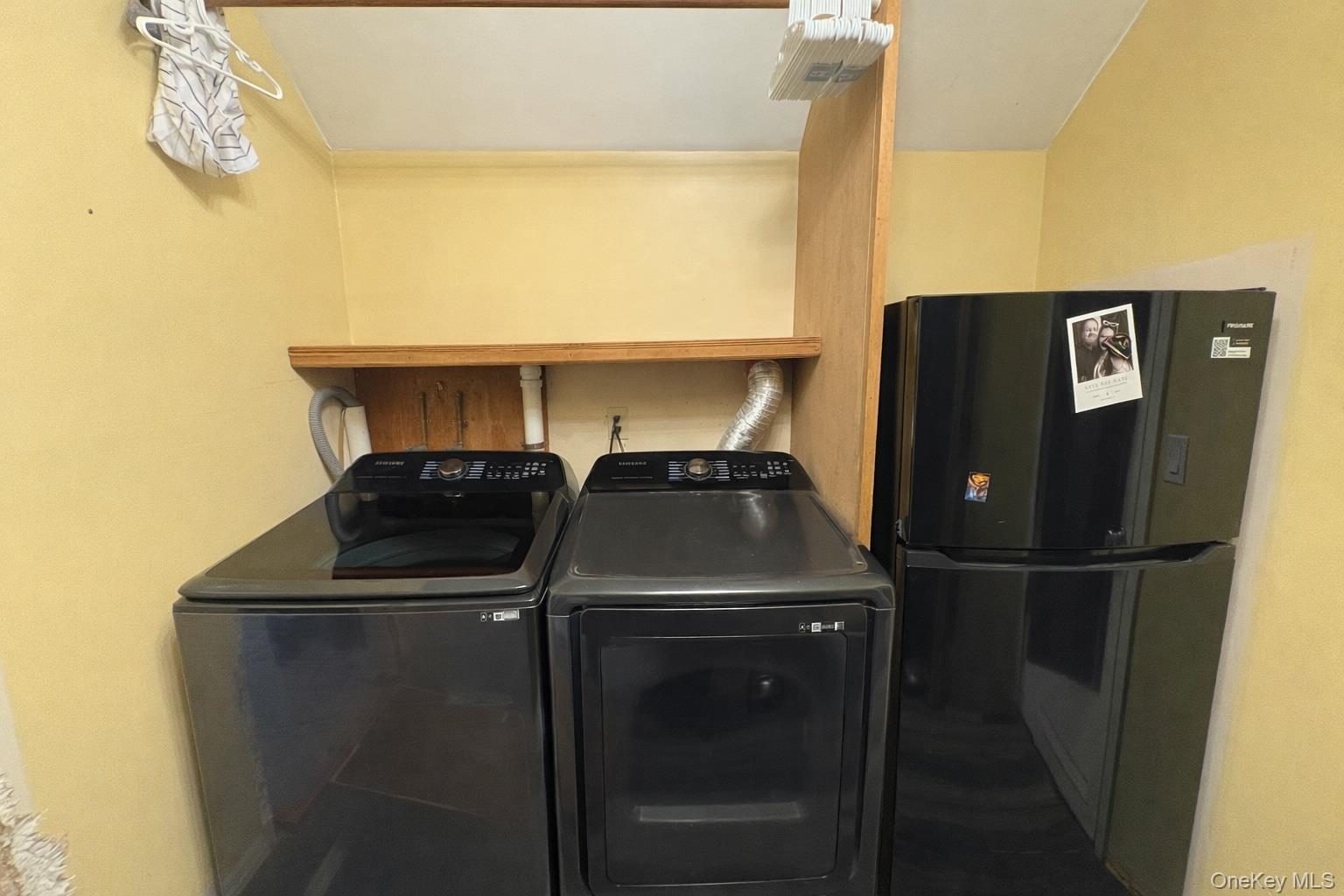40 Alton Road Babylon, NY 11702 - Photo 38 of 41 Washroom featuring washing machine and dryer
