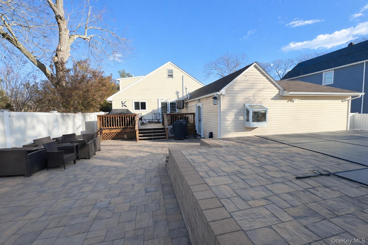 40 Alton Road Babylon, NY 11702 - Photo 10 of 41 View of patio featuring a wooden deck and an outdoor hangout area