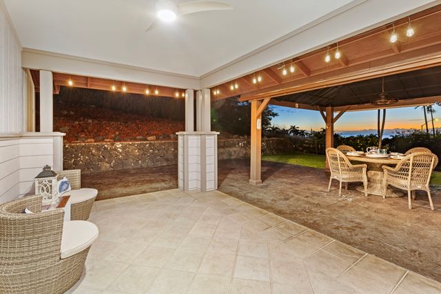 a view of a backyard with a patio