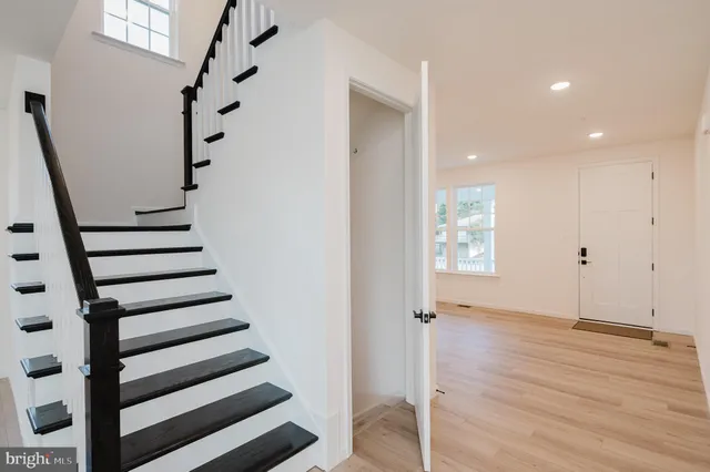 a view of entryway with wooden floor