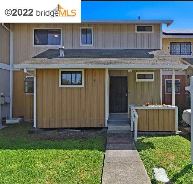 7400 Rudsdale Street, Unit B Oakland, CA 94621 - Photo 1 of 1 a front view of a house with garden