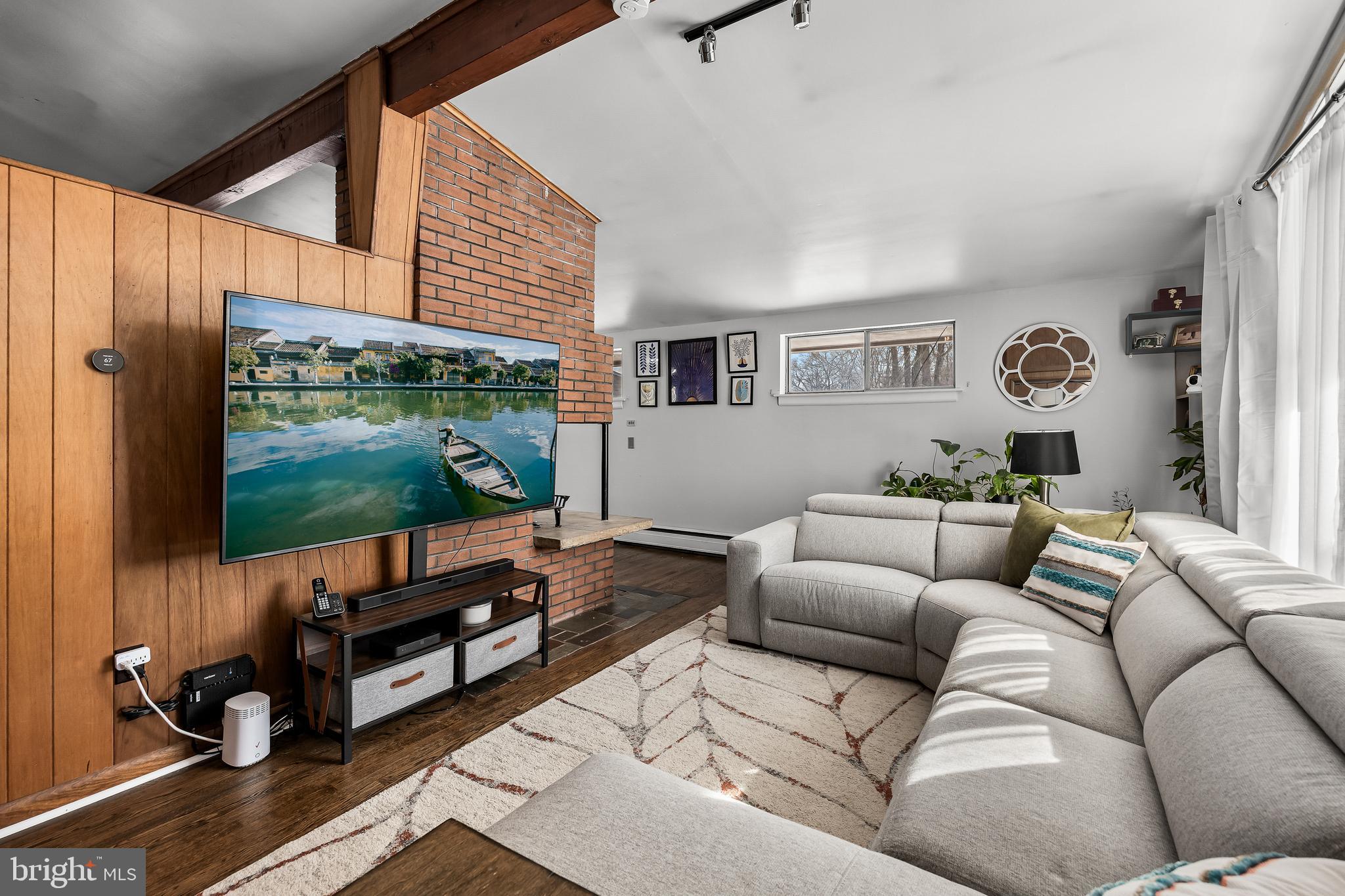 418 Sherry Way Cherry Hill, NJ 08034 - Photo 12 of 42 a living room with furniture and a flat screen tv