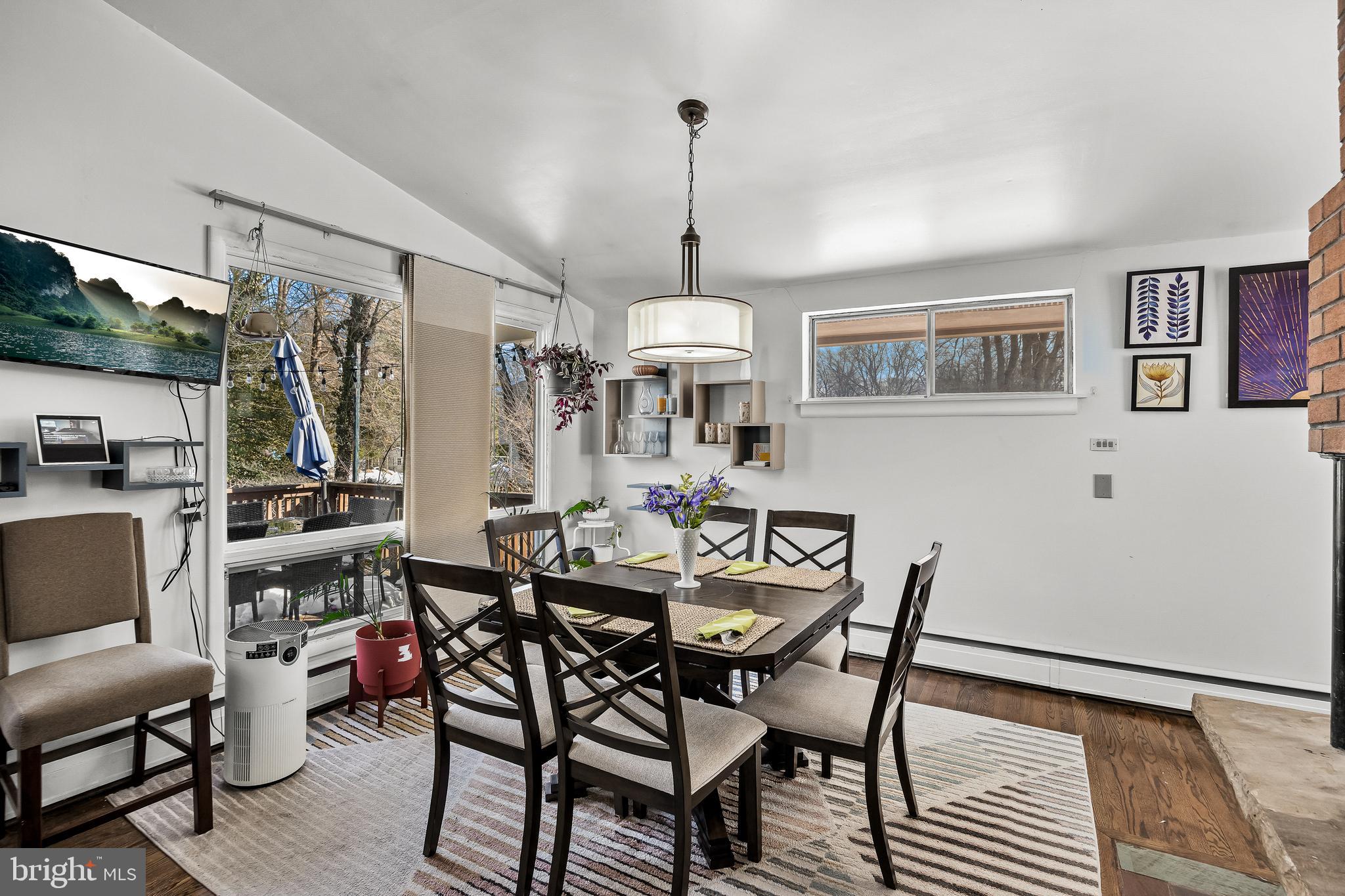 418 Sherry Way Cherry Hill, NJ 08034 - Photo 19 of 42 a view of a dining room with furniture window and wooden floor