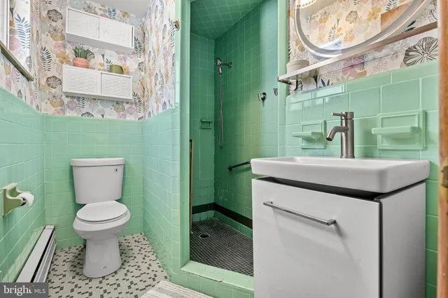 a bathroom with a sink and a toilet