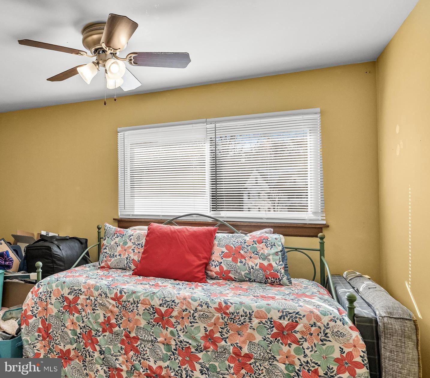 418 Sherry Way Cherry Hill, NJ 08034 - Photo 32 of 42 a bedroom with a bed and a chandelier