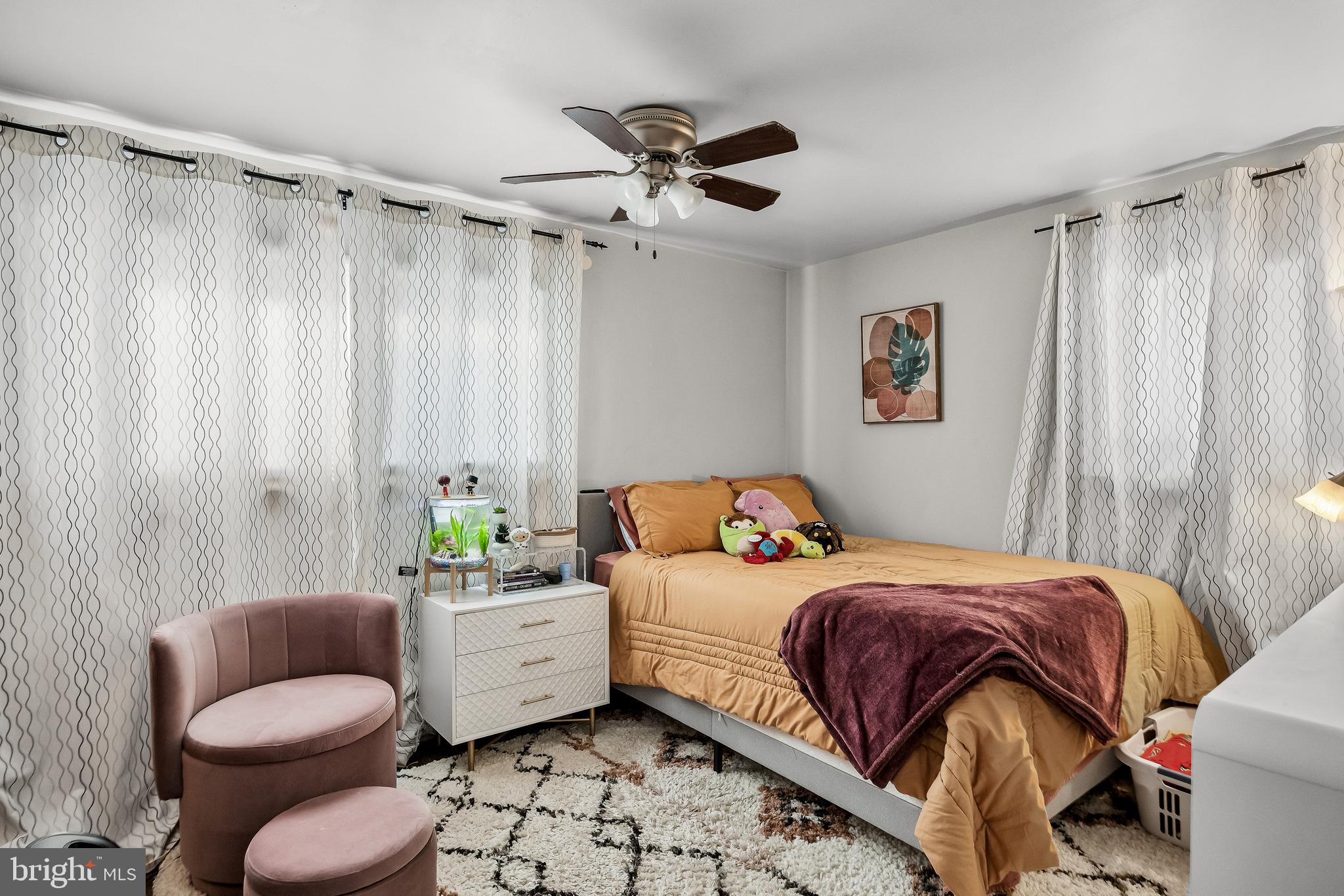 418 Sherry Way Cherry Hill, NJ 08034 - Photo 33 of 42 a bedroom with a bed and a couch