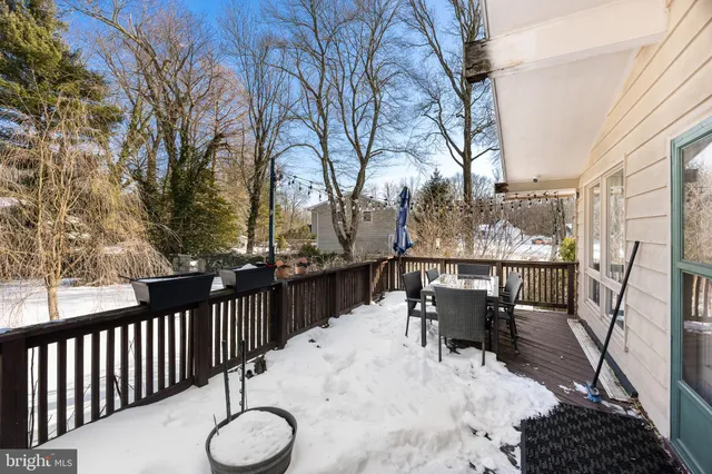 a view of a chairs and tables in the balcony