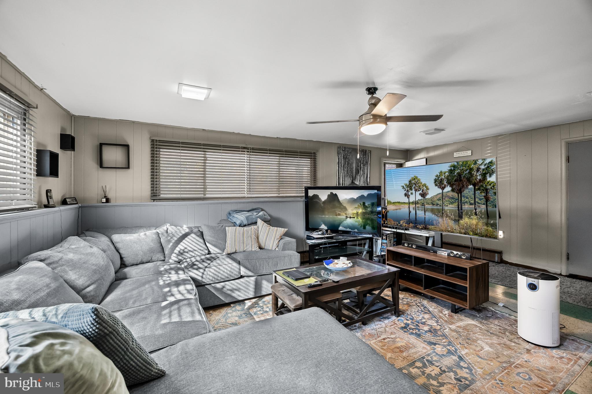 418 Sherry Way Cherry Hill, NJ 08034 - Photo 8 of 42 a living room with furniture a flat screen tv and a window