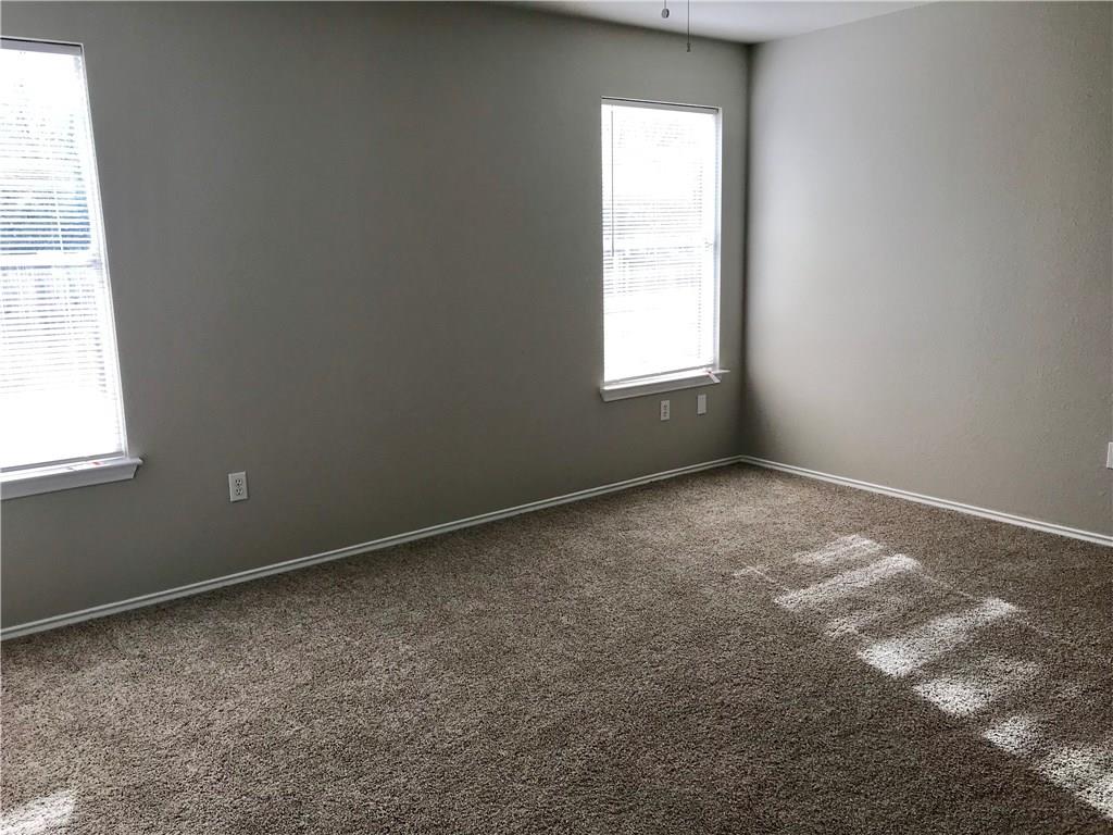 1251 Pine Portage Loop Leander, TX 78641 - Photo 11 of 17 an empty room with a window