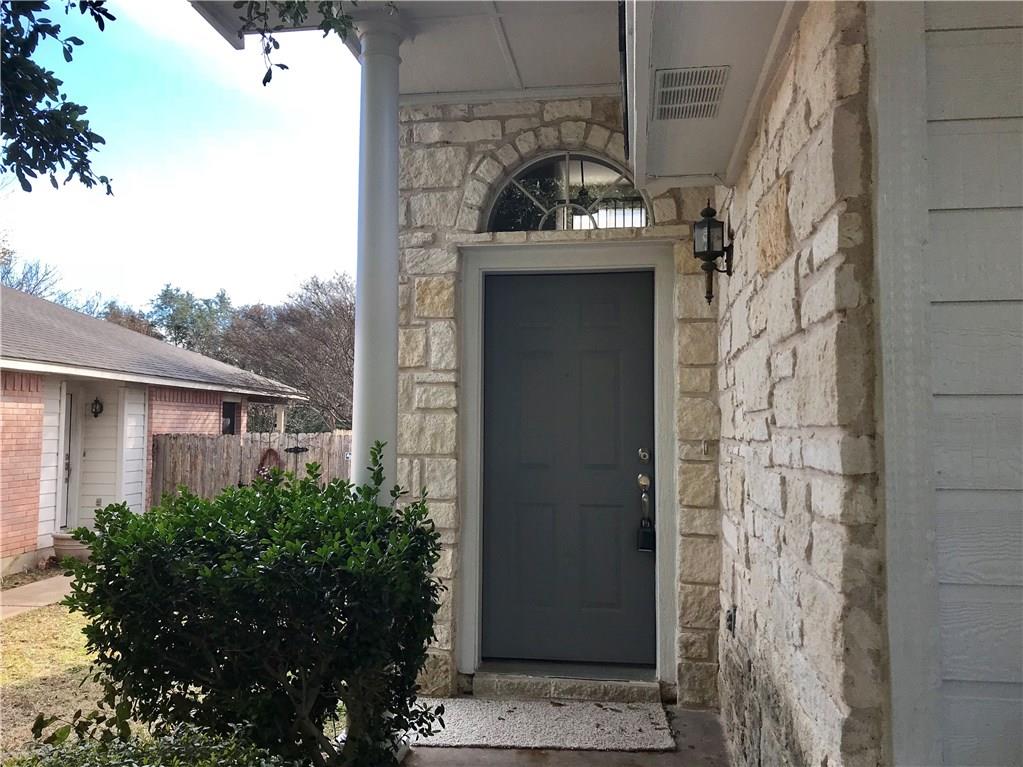 1251 Pine Portage Loop Leander, TX 78641 - Photo 2 of 17 a view of entryway with flower plants