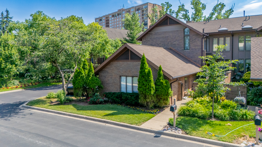 a view of a yard in front view of a house