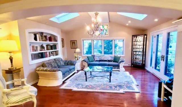 a kitchen with a stove a sink and a refrigerator