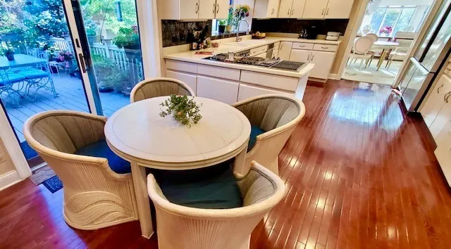 a bed room with a bed and a flat tv screen on a dresser