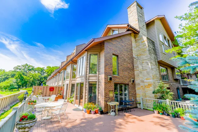 a view of a house with a street