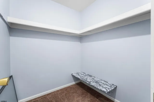 a room with a bench