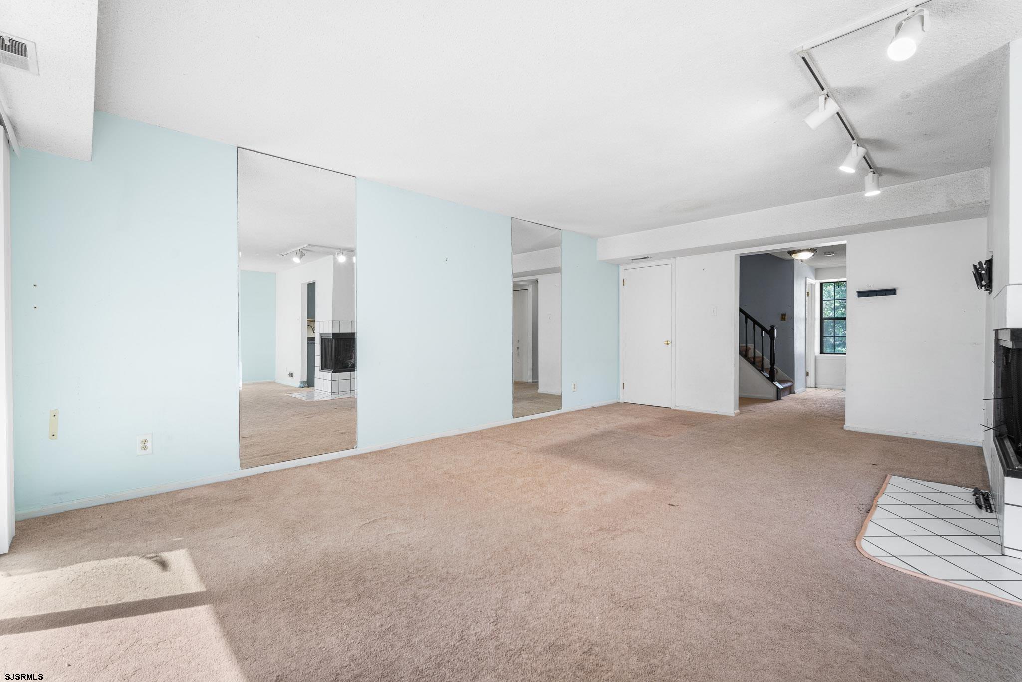 718 Cardinal Way Galloway Township, NJ 08205 - Photo 5 of 25 a view of an empty room with a bathroom
