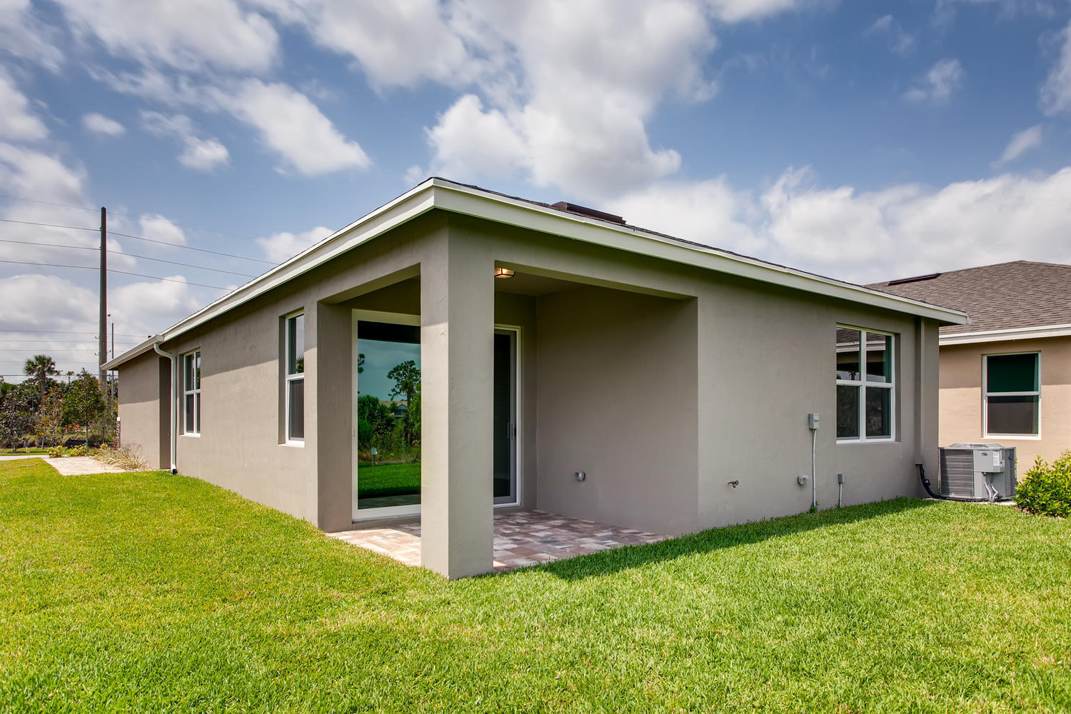 5753 Pinehurst Trail Hobe Sound, FL 33455 - Photo 17 of 17 Hastings-large-017-015-Back Yard-1500x10
