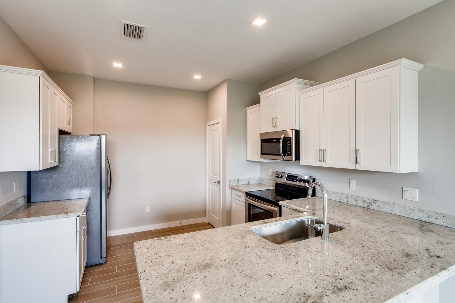 5753 Pinehurst Trail Hobe Sound, FL 33455 - Photo 6 of 17 Hastings-large-006-003-Kitchen-1500x1000