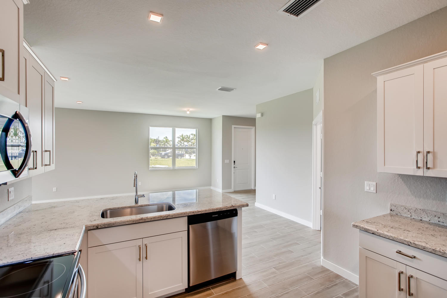 5753 Pinehurst Trail Hobe Sound, FL 33455 - Photo 8 of 17 Hastings-large-008-009-Kitchen-1500x1000