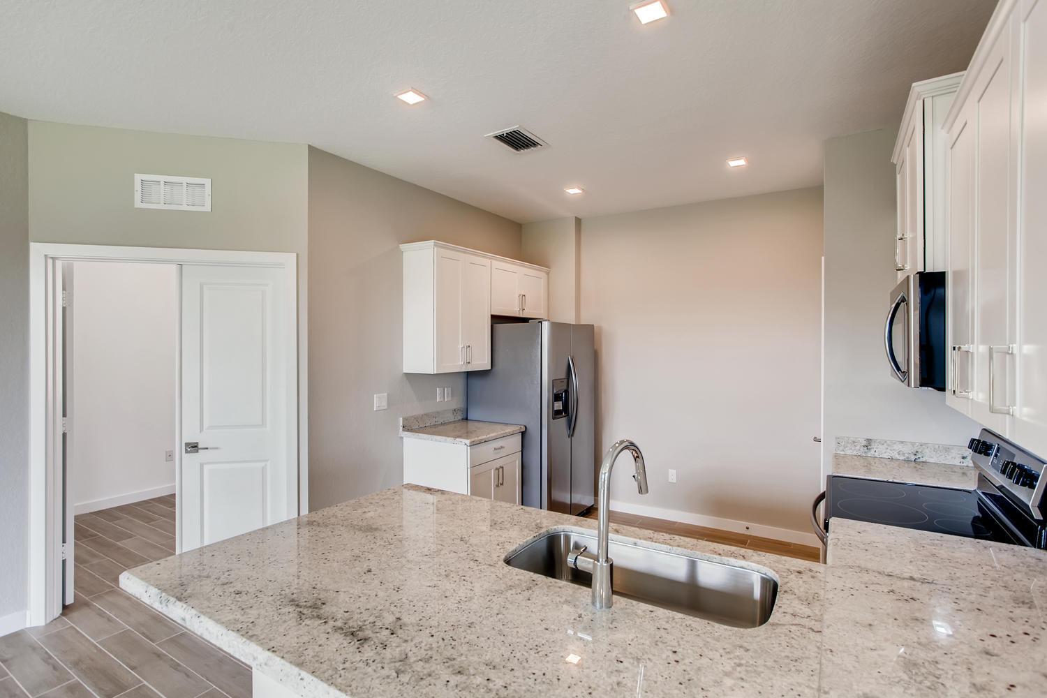 5753 Pinehurst Trail Hobe Sound, FL 33455 - Photo 9 of 17 Hastings-large-009-008-Kitchen-1500x1000