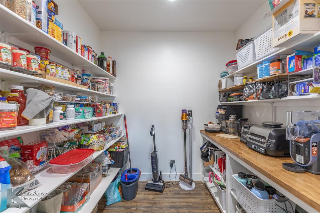 684 Taylor Ridge Estates Road Abilene, TX 79603 - Photo 12 of 39 a room with storage and utility