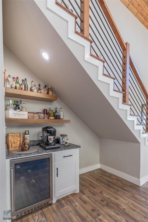 684 Taylor Ridge Estates Road Abilene, TX 79603 - Photo 13 of 39 a kitchen with stainless steel appliances granite countertop a stove and cabinets