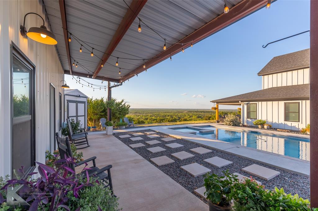 684 Taylor Ridge Estates Road Abilene, TX 79603 - Photo 31 of 39 a view of a house with swimming pool and sitting area
