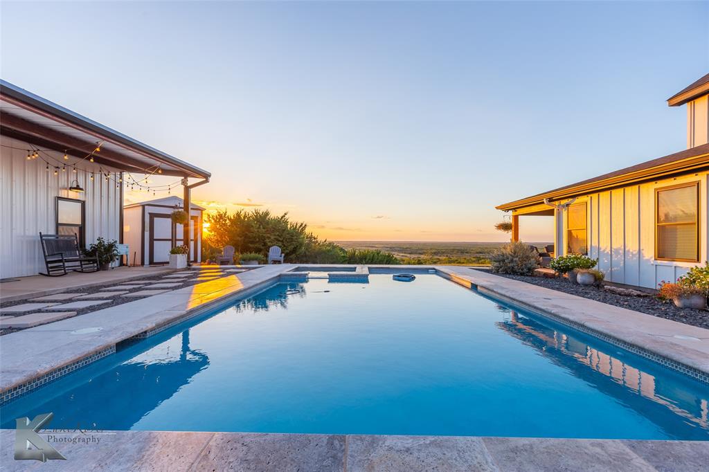 684 Taylor Ridge Estates Road Abilene, TX 79603 - Photo 33 of 39 a view of swimming pool with seating area
