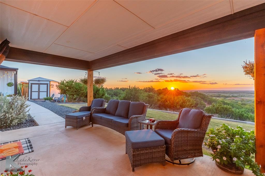 684 Taylor Ridge Estates Road Abilene, TX 79603 - Photo 35 of 39 a outdoor living space with furniture and garden view