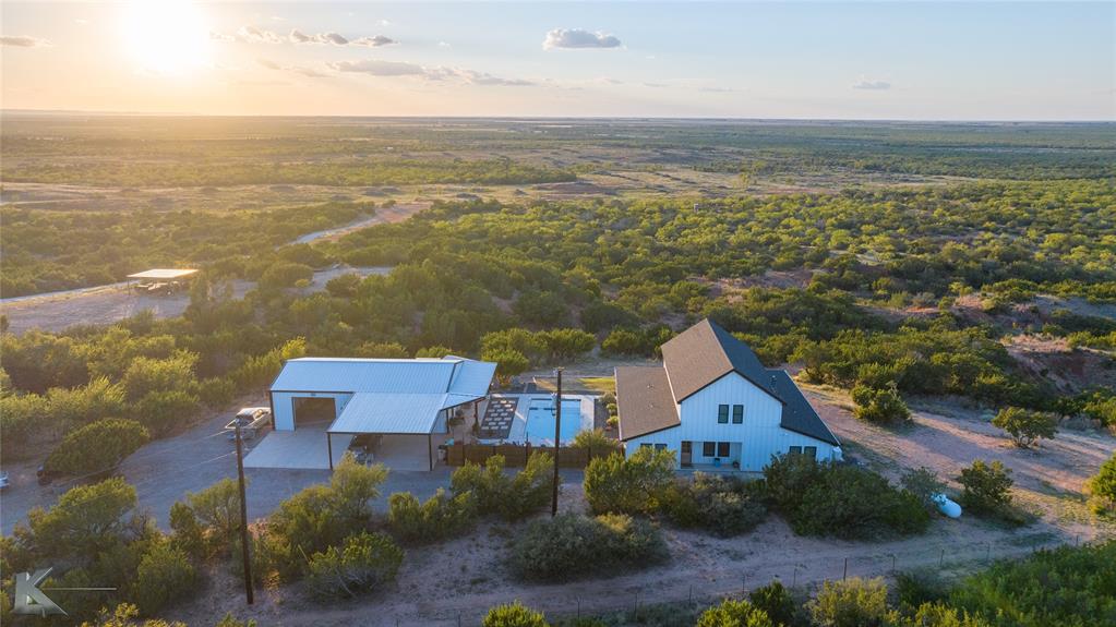 684 Taylor Ridge Estates Road Abilene, TX 79603 - Photo 39 of 39 an aerial view of ocean with residential house and green space