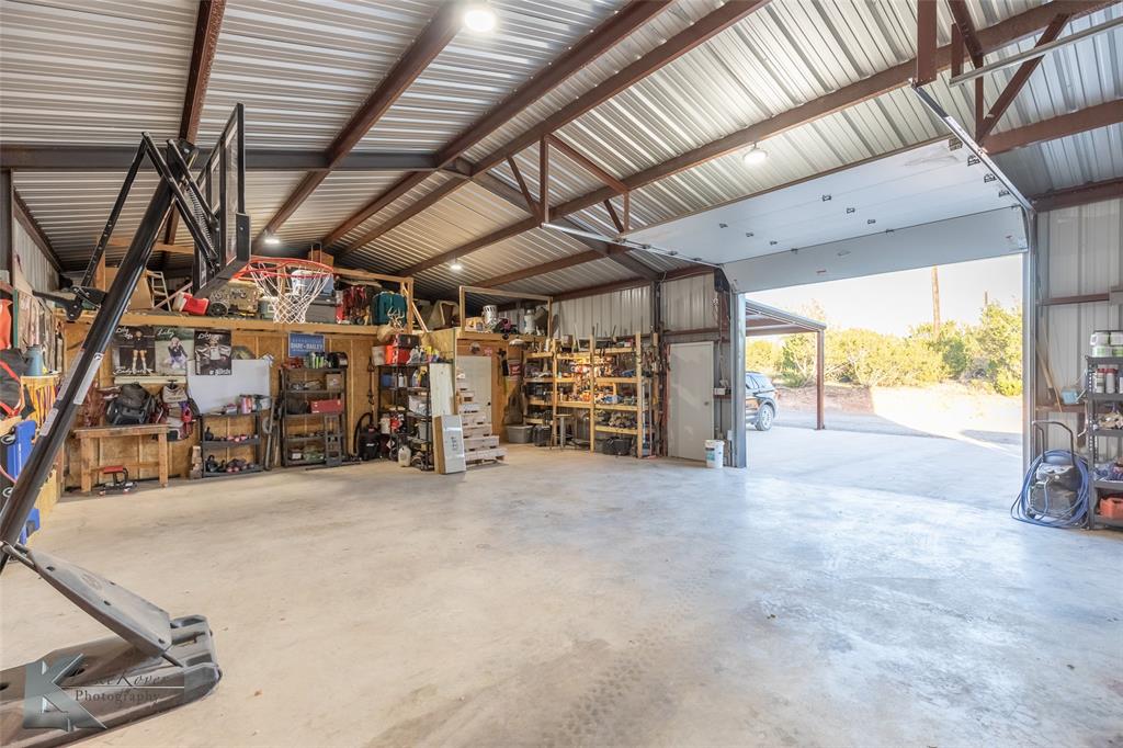 684 Taylor Ridge Estates Road Abilene, TX 79603 - Photo 4 of 39 a view of a room with gym equipment