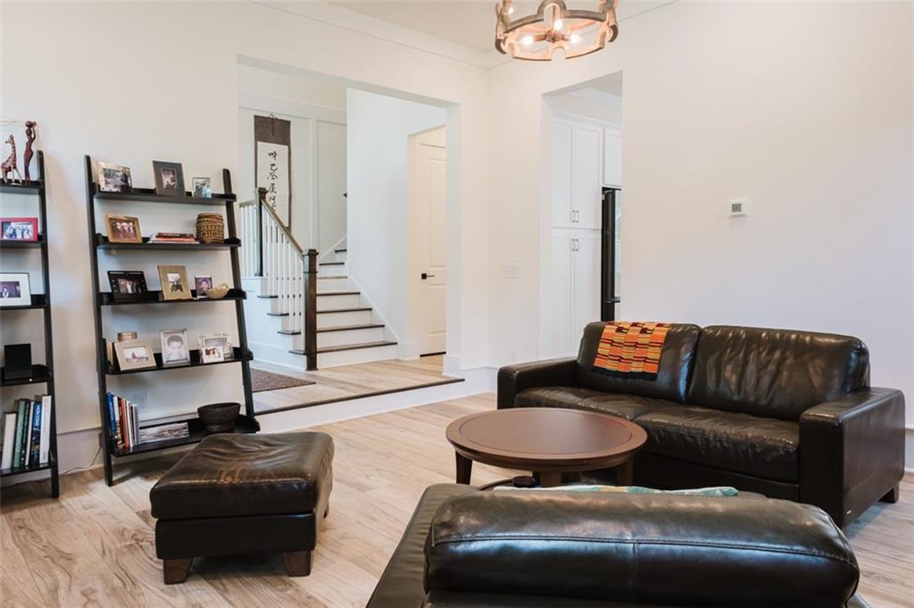 330 Mount Zion Road Southwest Hapeville, GA 30354 - Photo 11 of 41 a living room with furniture and a lamp