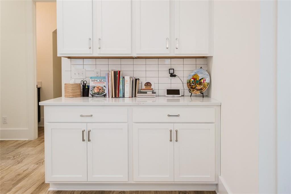 330 Mount Zion Road Southwest Hapeville, GA 30354 - Photo 15 of 41 a kitchen with white cabinets and white appliances