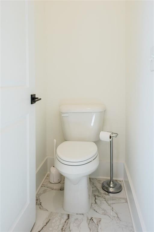 330 Mount Zion Road Southwest Hapeville, GA 30354 - Photo 22 of 41 a bathroom with a toilet and a rug