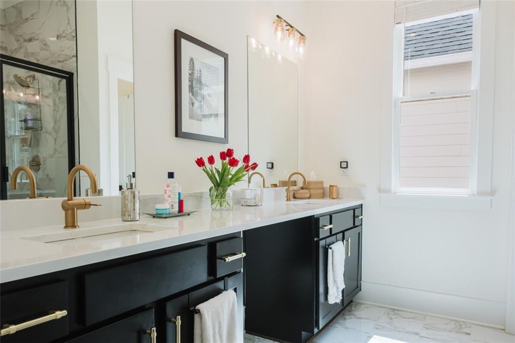 330 Mount Zion Road Southwest Hapeville, GA 30354 - Photo 23 of 41 a bathroom with a sink and a mirror