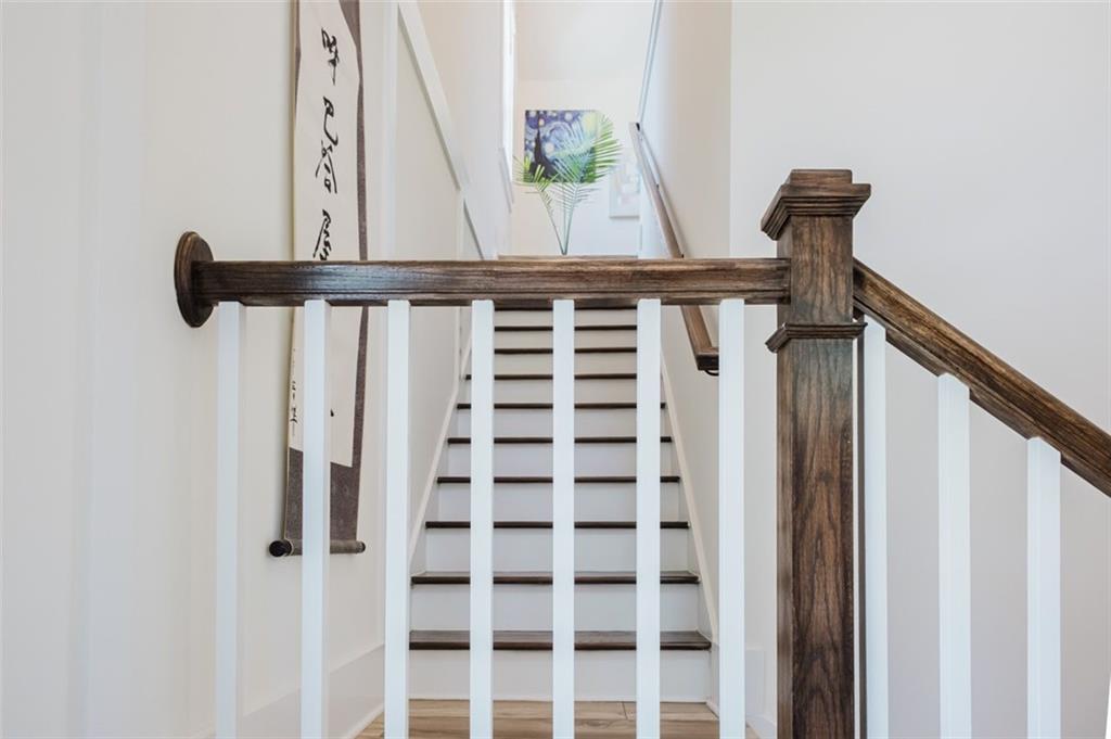 330 Mount Zion Road Southwest Hapeville, GA 30354 - Photo 26 of 41 a close view of a utility room with dryer and stairs
