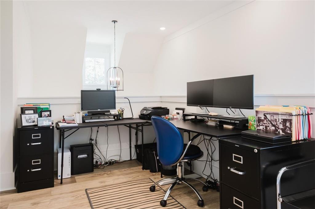330 Mount Zion Road Southwest Hapeville, GA 30354 - Photo 28 of 41 a view of a workspace with furniture and wooden floor