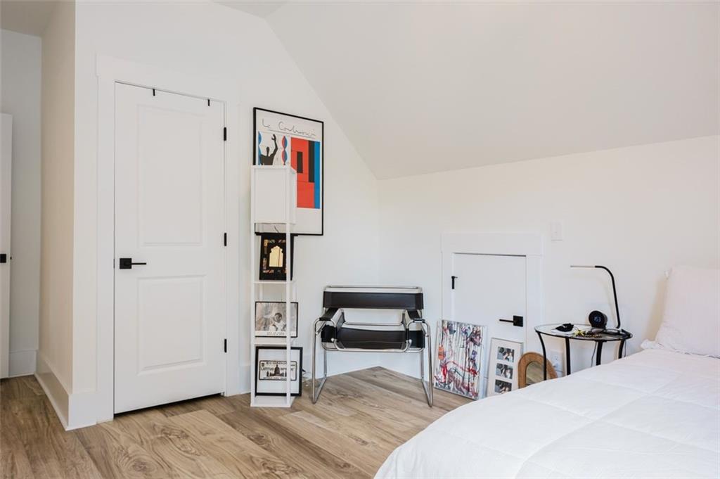 330 Mount Zion Road Southwest Hapeville, GA 30354 - Photo 29 of 41 a bedroom with furniture and wooden floor