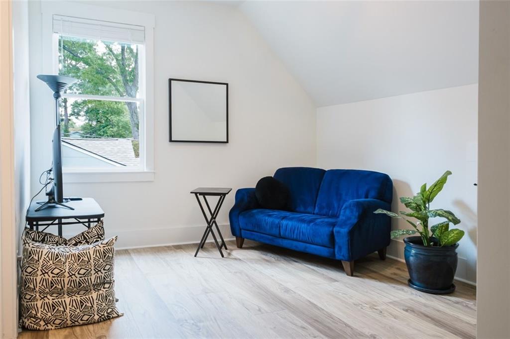 330 Mount Zion Road Southwest Hapeville, GA 30354 - Photo 31 of 41 a living room with furniture and a potted plant