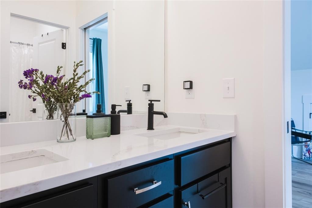 330 Mount Zion Road Southwest Hapeville, GA 30354 - Photo 33 of 41 a bathroom with a sink and a mirror