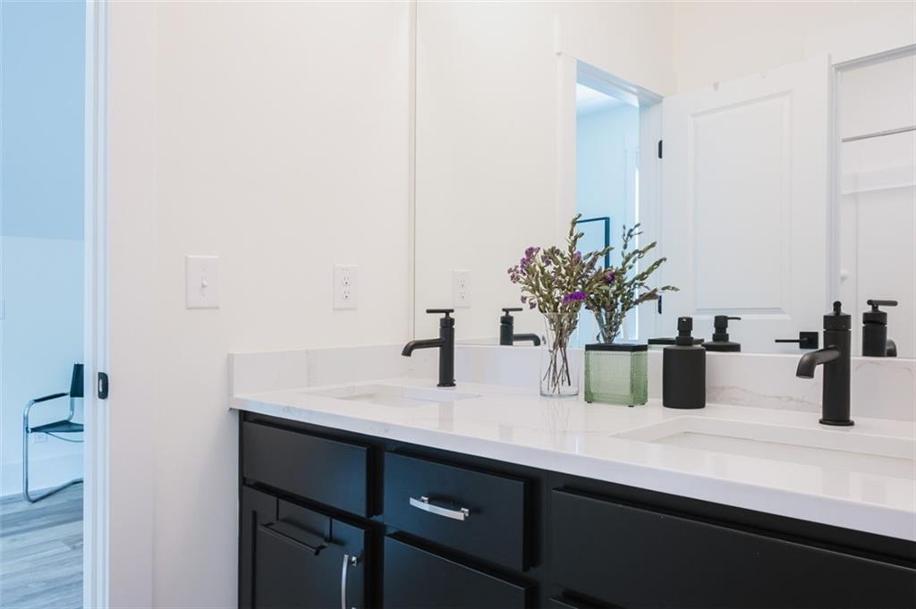 330 Mount Zion Road Southwest Hapeville, GA 30354 - Photo 34 of 41 a bathroom with a sink and a mirror