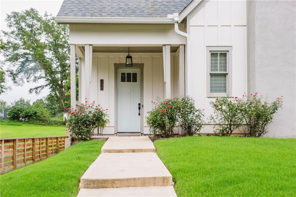 330 Mount Zion Road Southwest Hapeville, GA 30354 - Photo 5 of 41 a front view of a house with a yard